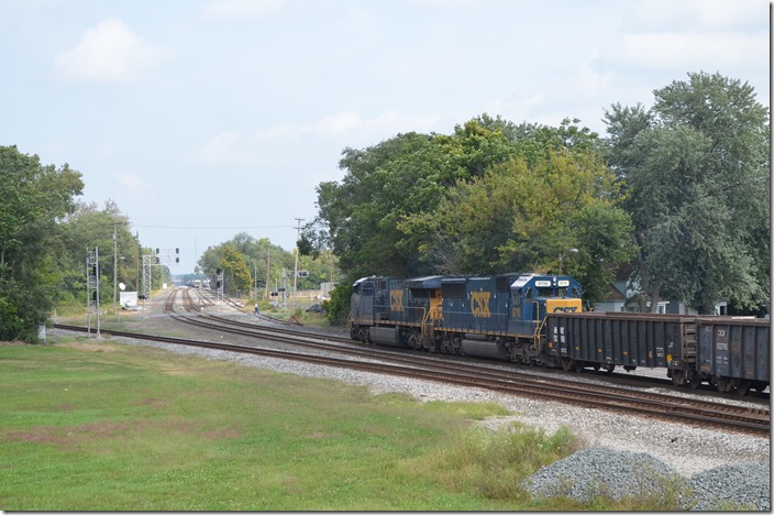 CSX e/b K594 (Rose Lake to Youngstown, OH) empty pipe gons behind 651-8710.